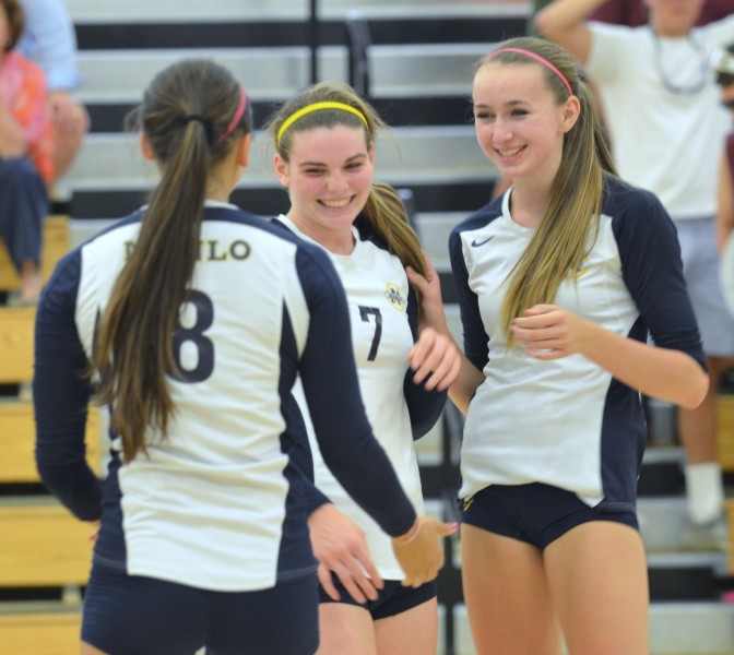 Junior Lida Van de Meer celebrates with teammates.