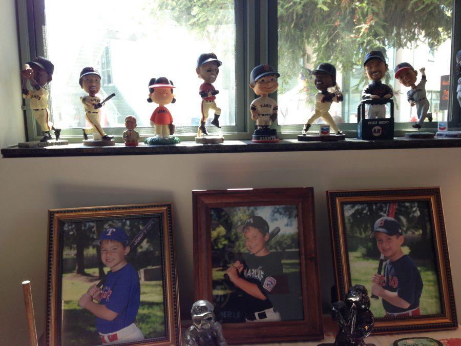 Bobbleheads+sit+on+a+windowsill+in+Mr.+Clevengers+office.