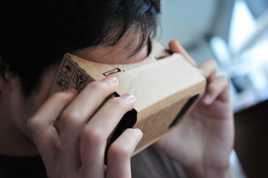 Numerous tech companies, such as Google, Facebook, and Intel, set up booths at Maker Faire. Google’s booth included numerous interesting projects including cardboard virtual reality glasses called Google Cardboard which enables users to watch or play games in 3D. Above is Freshman Tommy Yang playing a game with the Google Cardboard.