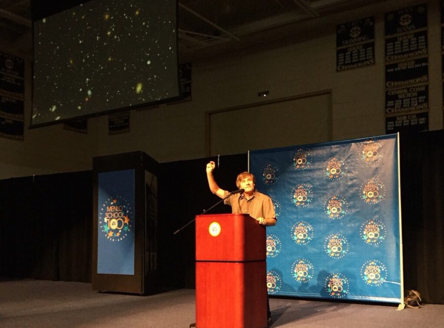 Astrophysicist Dr. Alex Filippenko addresses students with inspiration and humor