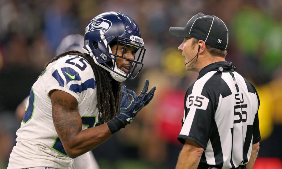 Oct 30, 2016; New Orleans, LA, USA; Seattle Seahawks cornerback Richard Sherman (25) talks to side judge Alex Kemp (55) in the second half against the New Orleans Saints at the Mercedes-Benz Superdome. The Saints won, 25-20. Mandatory Credit: Chuck Cook-USA TODAY Sports