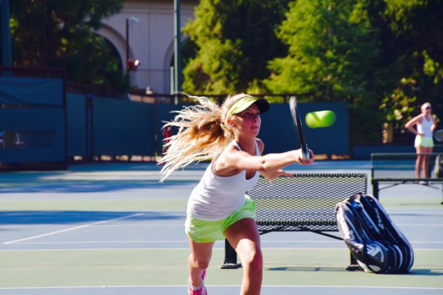 Girls tennis breezes past cross-town rival MA