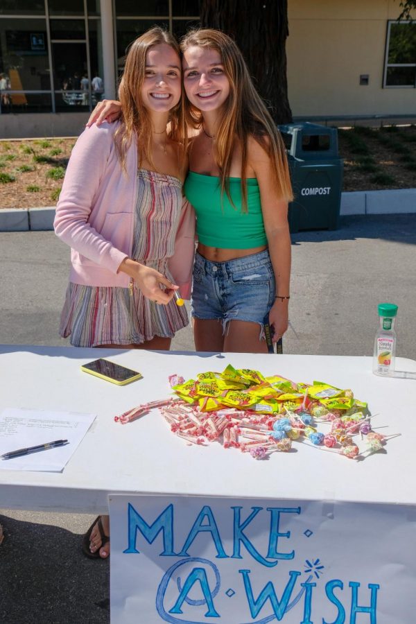 Abby Doll and Alex McCusker pose for a picture at the Clubs Fair. Staff Photo: Caroline Frantz.