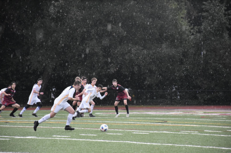 Senior Connor Nelson takes the ball down the field. Photo courtesy of Sadie Stinson. 