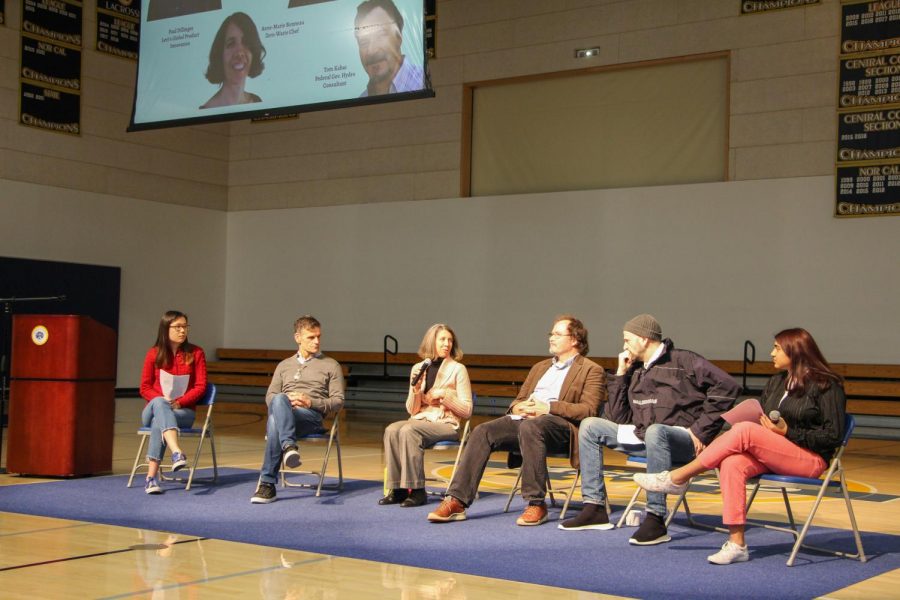 Anne-Marie Bonneau, Paul Dillinger, Tom Kabat and Dennis Woodside speak at assembly on a variety of topics relating to sustainability, such as fast fashion and the meat industry. Staff photo: Sadie Stinson.