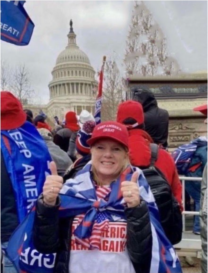 Tinsley+poses+for+a+photo+in+front+of+the+Capitol+wearing+a+flag%2C+hat+and+shirt+that+read%2C+Make+America+Great+Again+and+%E2%80%9CKeep+America+Great.%E2%80%9D+The+photo+circulated+on+social+media+after+it+was+leaked+from+a+group+chat+that+Tinsley+sent+it+to.