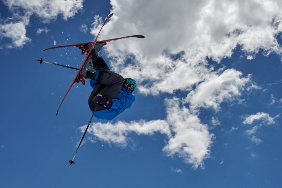 Junior Max Saito flies through the air on his skis. “I go pretty big; I’ve jumped off 50 foot cliffs.” Photo courtesy of Max Saito.