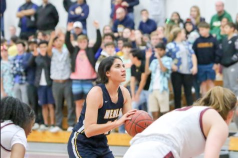Nejad shoots a free throw in a game against the Sacred Heart School varsity girls basketball team. The senior captain has been on the varsity team all four years of high school and is now committed to play Division III basketball at Pomona College. Photo courtesy of Sharon Nejad.