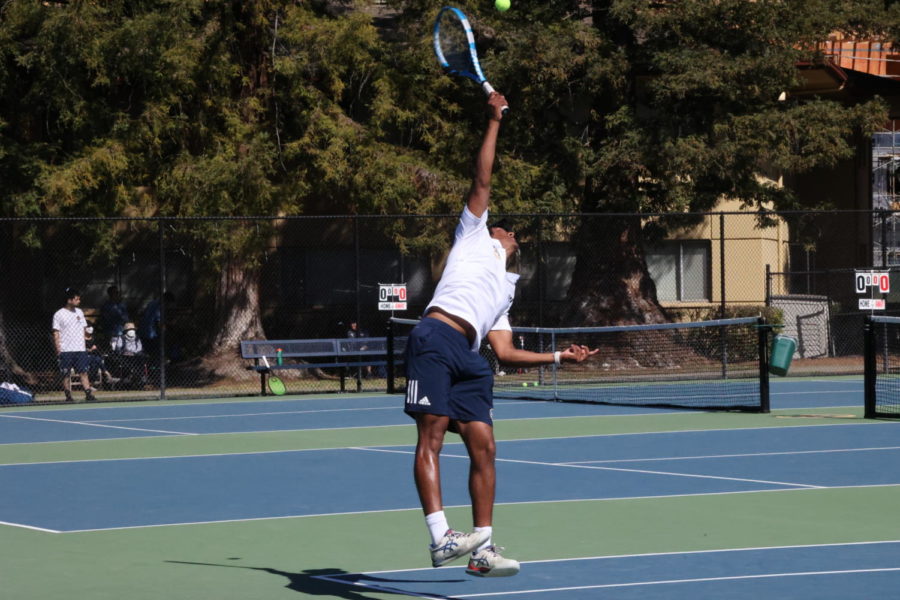 Senior Rishi Jain serves the ball during the third annual Bay Area Classic tournament. Jain went 4-0 in doubles throughout the tournament. Staff photo: Lexi Friesel.