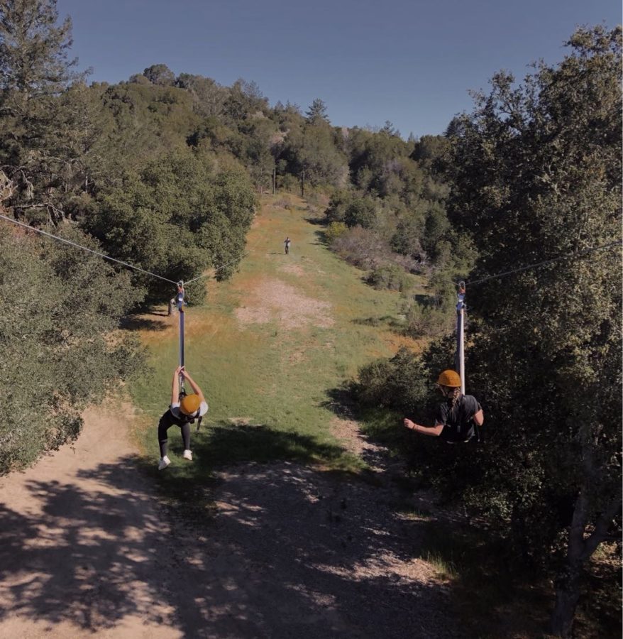 Two sophomores zipline during their retreat in the Santa Cruz mountains. Photo courtesy of Madison Brown. 