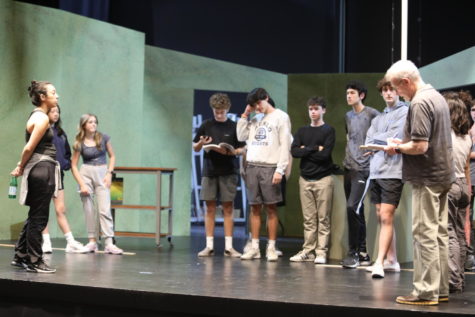 Minning and choreographer Angela Curroto-Pierson speak to the cast and crew at the start of their first tech rehearsal on Wednesday, Oct. 19. Staff photo: Sonia Dholakia
