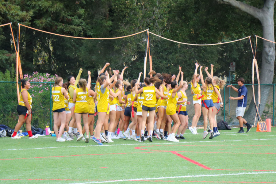The class of 2022 girls football team celebrates their victory in last years contest. Photo courtesy of Michaela Courand