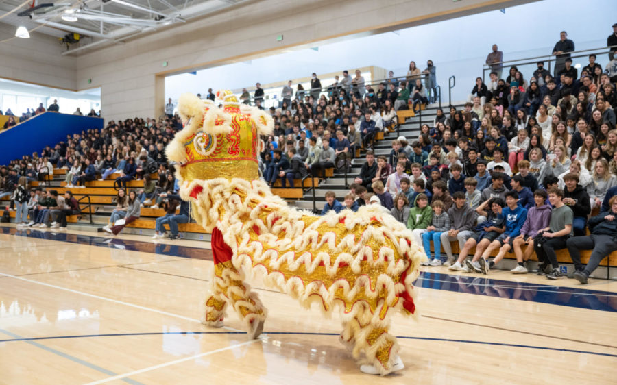 In the Upper School gym, Mandarin students perform a lion dance during the Lunar New Year Assembly. Photo courtesy of Kevin Chan
