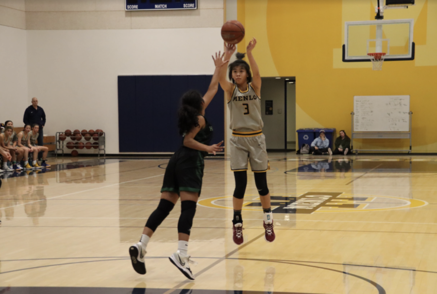 Sophomore+Ruiqi+Liu+attempts+a+three+pointer%2C+while+a+Harker+player+tries+to+block+the+shot.+Photo+courtesy+of+Lucia+Aguilar.++