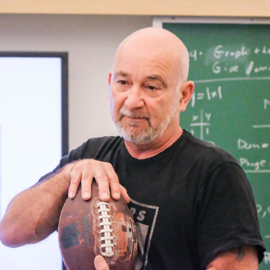 Henry Klee introduces a presentation about Super Bowl football. Photo by Pete Zivkov.