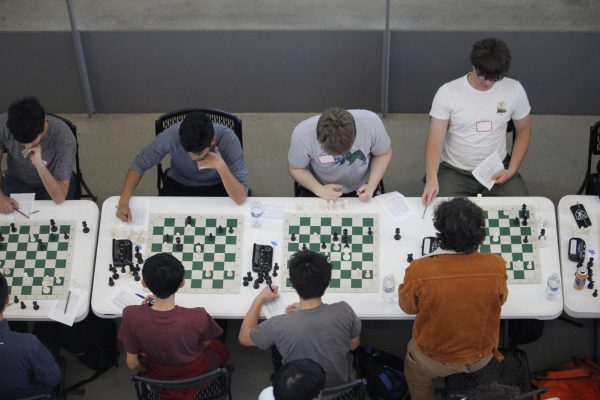 Students play in the first Menlo-hosted, interscholastic chess tournament on Saturday, April 22, 2023. Staff photo: Geoffrey Franc