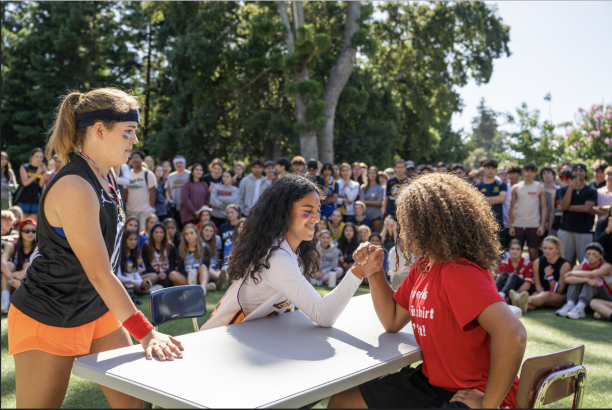 Junior Lily Kautai and Senior Aaliyah Sanders contend in a spirit activity, specifically an arm-wrestling tournament during lunch. Photo courtesy of Kevin Chan