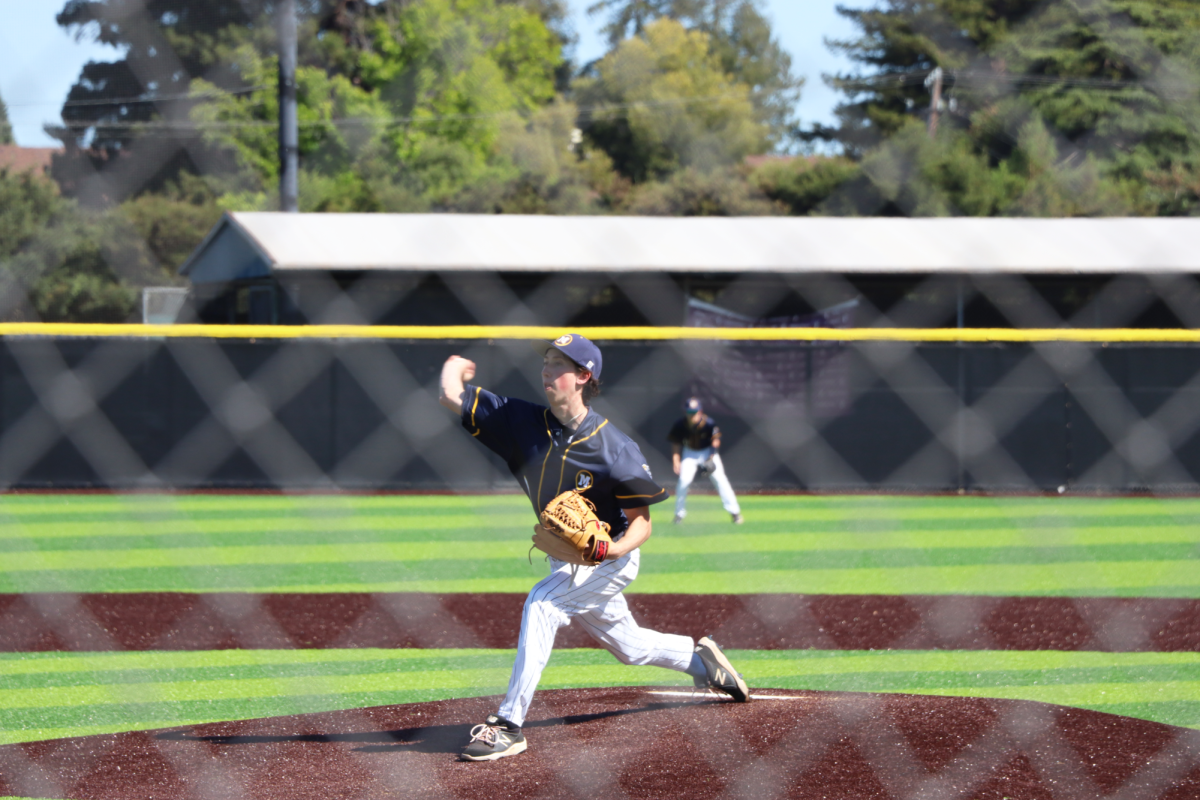Senior Ryan Schnell throws a pitch in the first inning.