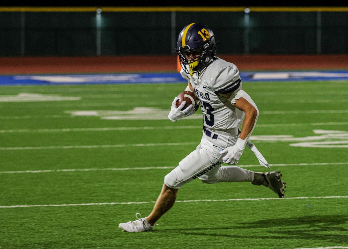 Junior Trevor van der Pyl runs with the ball.