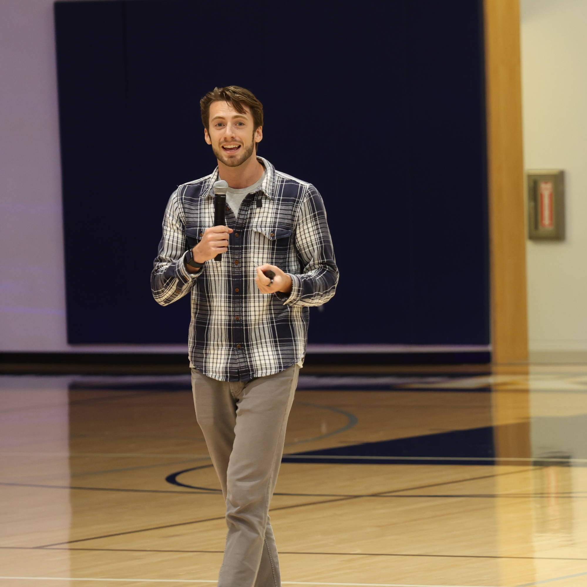 Dino Ambrosi speaks to students at Menlo School during an assembly on Sept. 17.