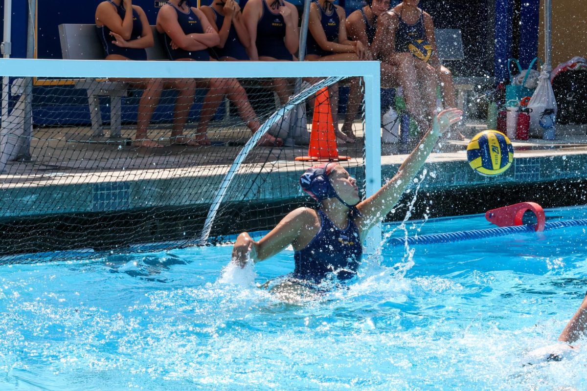 Junior goalkeeper Lilla Halasz blocks a shot at the Amanda MacDonald Tournament on Sept. 20.