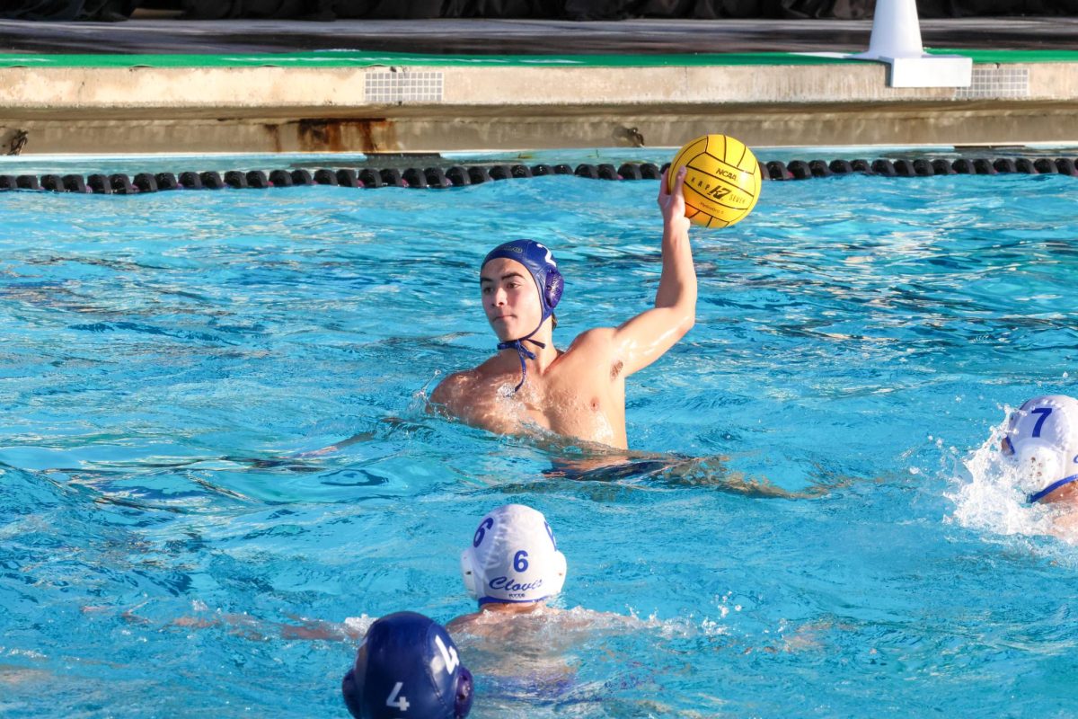 Freshman Adam Afar shoots the ball in the fourth quarter. Photo courtesy of Blake Putanec.