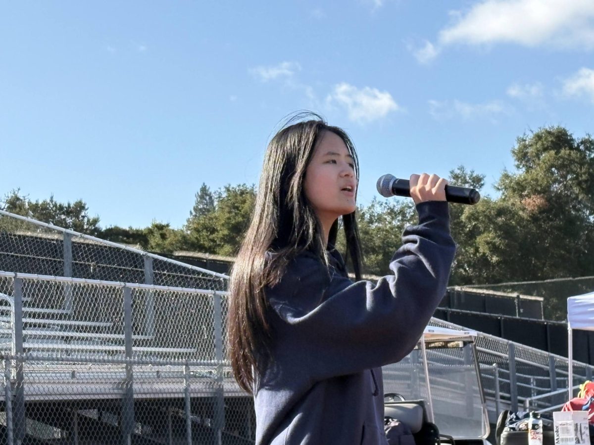 Sophomore Vivian Sun sings the national anthem at Cartan Field. Photo courtesy of Sun.