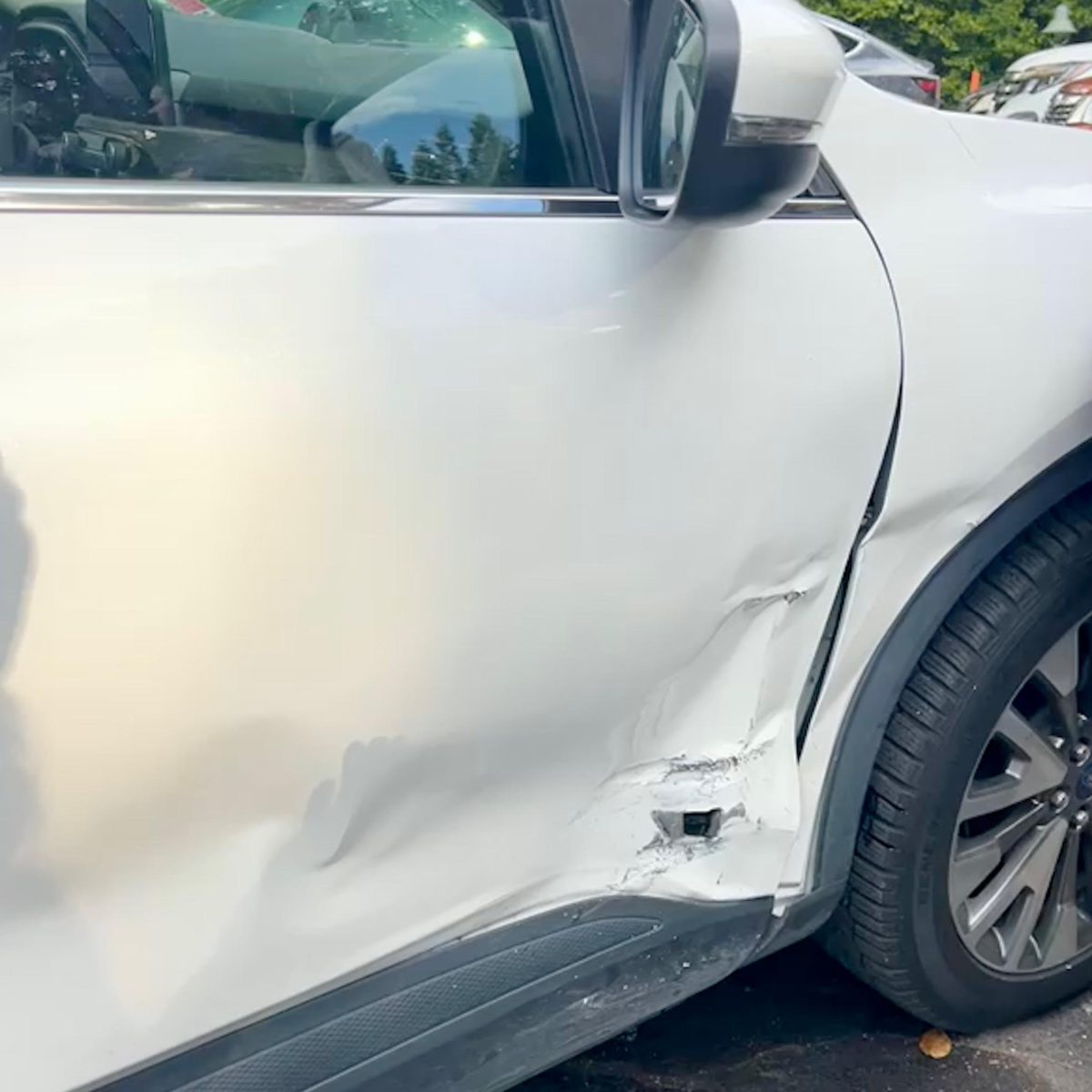 A car is parked in the student lot after getting rammed into hours earlier on Dec. 5. 