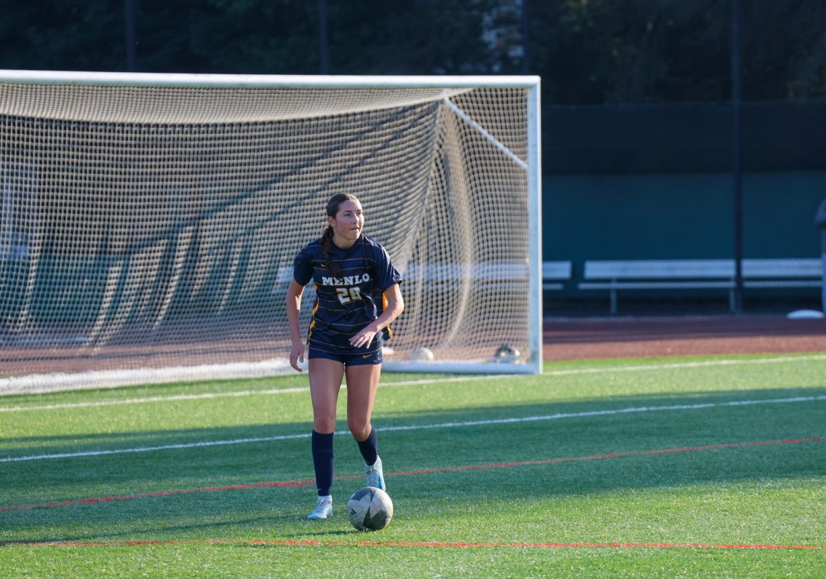 Junior Katie Kossow prepares to pass.