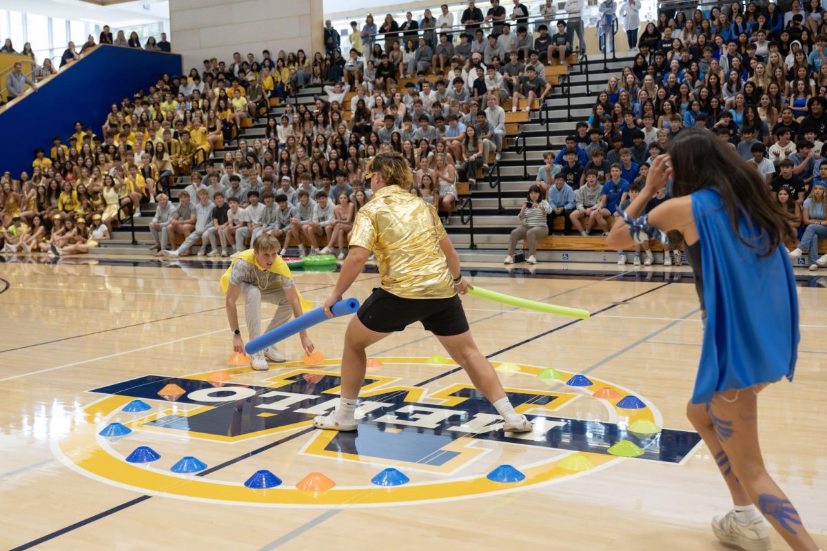 Seniors Landon Pretre and Kyle Mahaffey play a spirit game at an all school pep rally. Photo courtesy of Kevin Chan