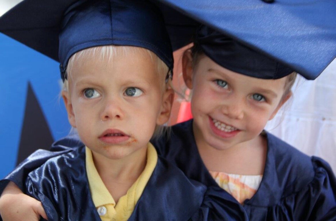 Junior Bella Jensen poses for a photo with her brother at their Menlo daycare graduation. Photo courtesy of Jensen