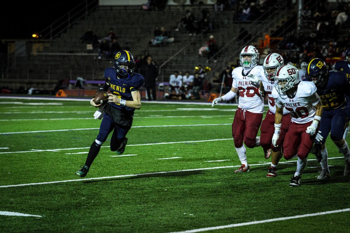 Junior Jack Freehill runs the ball in the Knight’s game against Palma High
School on Nov. 23.