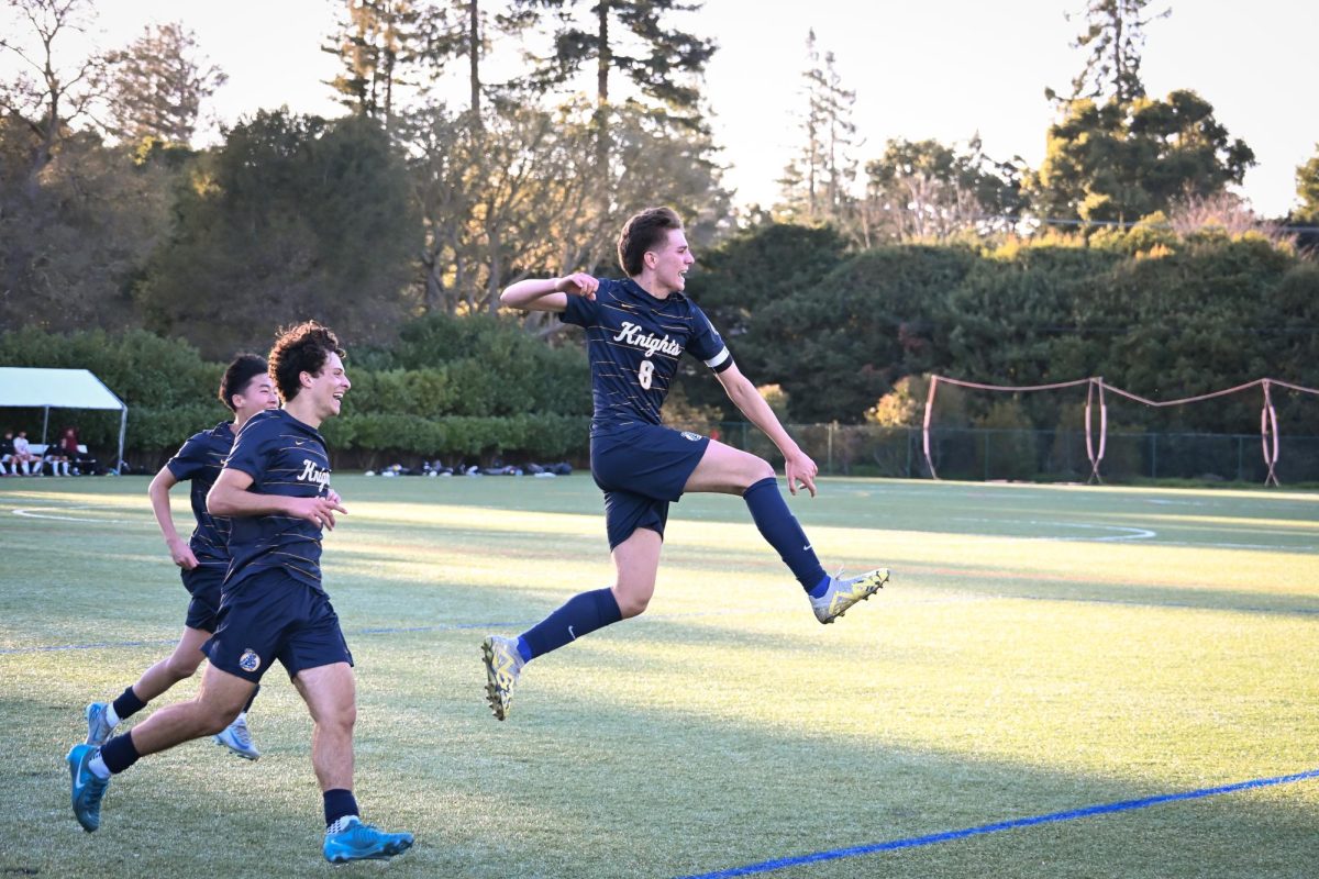 Senior and captian Gabriel Gil leaps in the air during Menlo's game against Sacred Heart Prep. Gil scored the only goal of the game. Photo courtesy of Erica McMullen