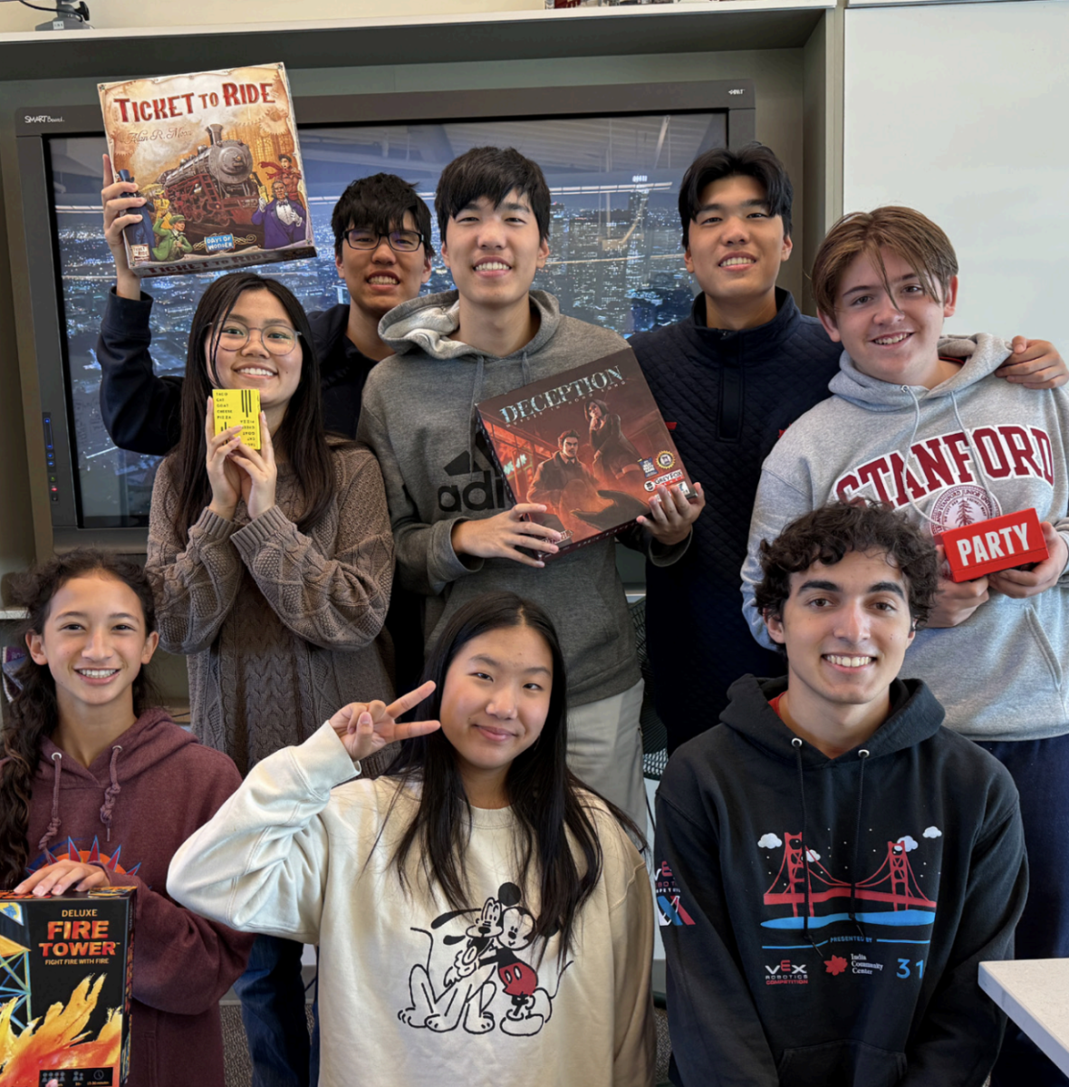 Board Game Club with its two co-leaders and six new members. Photo courtesy of Douglas Kiang