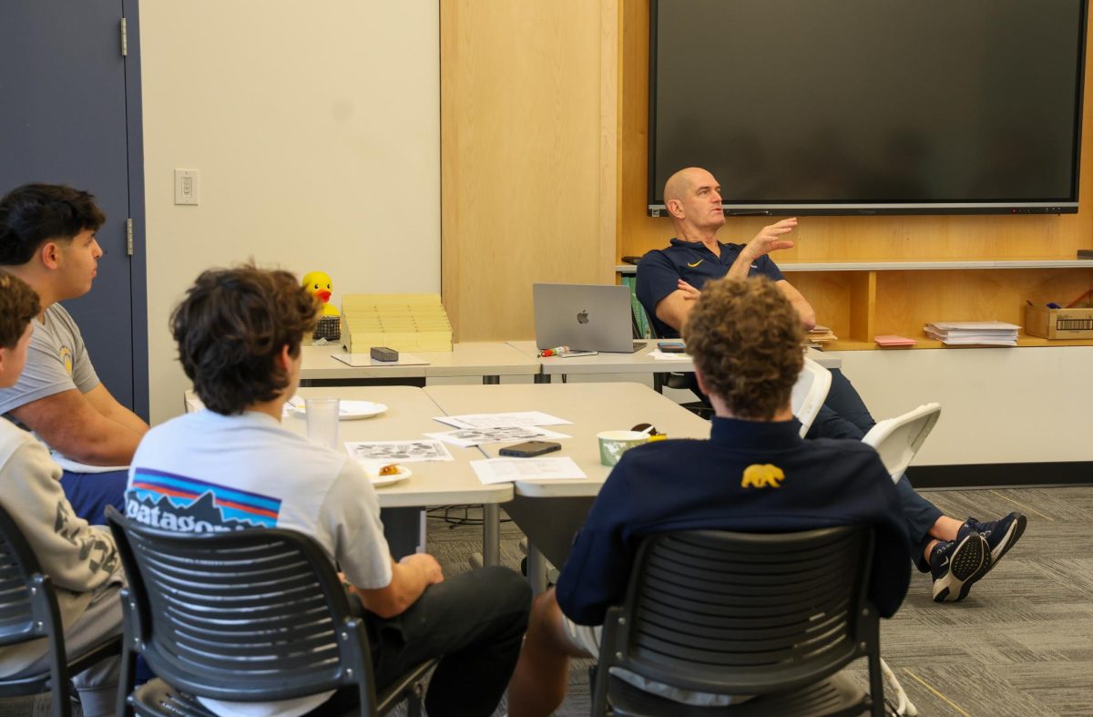 Athletic Director Earl Koberlein speaks to the Knights Leadership Council during a lunchtime meeting on Tuesday, Feb. 4.