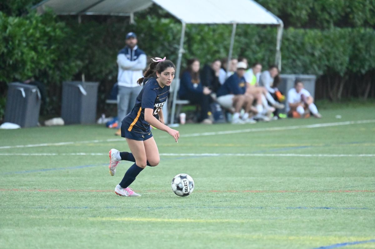 Senior captain Krista Arreola (#15) looks for a shot on goal. 