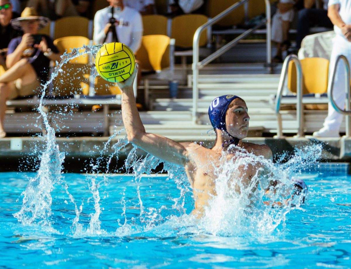 Sophomore Hunter Coleman launches a shon on goal during a game against La Jolla High School at the Roche Invitational. 
